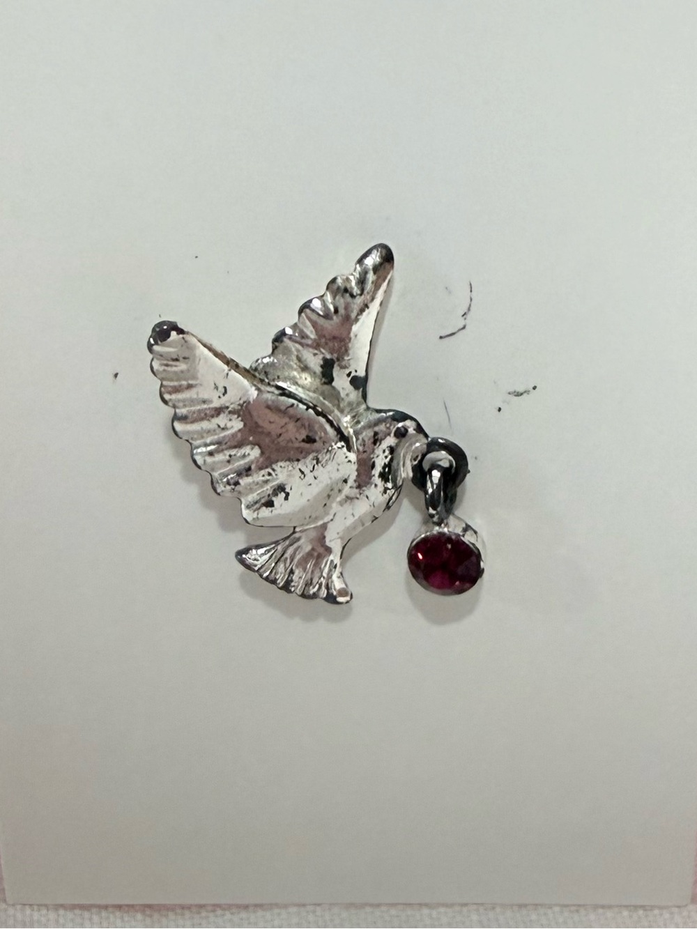 Avon Silver Dove Pin with Red Crystal Accent